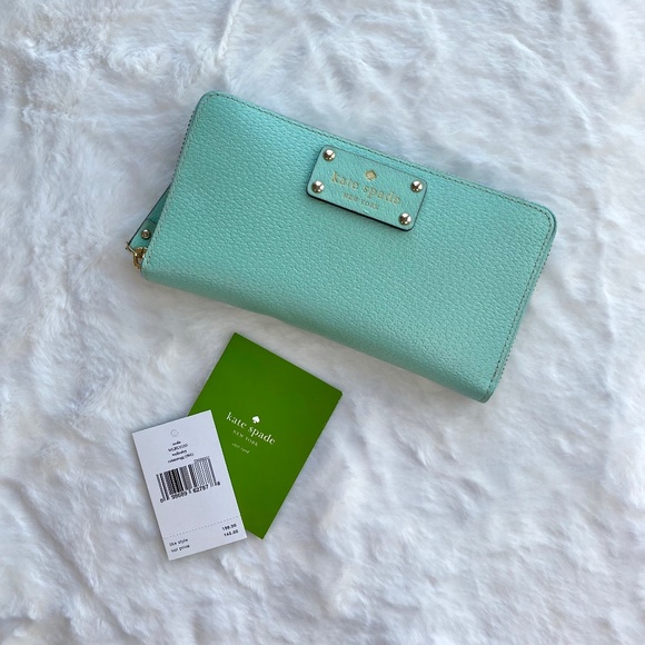 kate spade Handbags - Kate Spade Light Blue Large Zip Around Continental Wallet with Original Tags